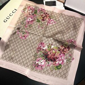 Gucci Floral Silk Scarf with Pink and Brown Accents comes with a Gucci dust bag.